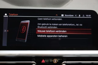 BMW 3 Serie Sedan 330i High Executive M Sport Pakket Automaat  / Live Cockpit Professional / Head-Up Display / Leder / Harman Kardon / LED / Stoelverwarming / Driving Assistant / Achteruitrijcamera / M Sportremsysteem / DAB / Ambiance Verlichting / 30