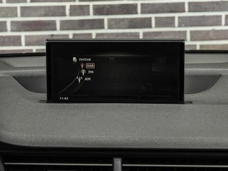 Audi Q7 3.0 TFSI quattro S-Line Panoramadak B&O Advanced Nachtzicht Luchtvering Leder ACC HUD Virtual Cockpit Soft-Close Achterasbesturing Trekhaak 21" / 30