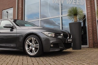 BMW 3-serie Touring 318i Centennial Executive M-sport | 2e eigenaar | HiFi audio | Navigatie | Bluetooth | Climate control | M-sportstuur | Cruise control | PDC | 18 inch | Trekhaak / 39