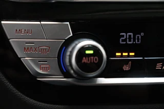 BMW iX3 High Executive 80 kWh Automaat  / Driving Assistant Professional / SOH 97% / Live Cockpit Professional / Trekhaak / Panoramadak / Adaptief Onderstel / Leder / Harman Kardon / Shadow Line / Head-Up Display / Adaptieve LED-koplampen / DAB / 20 Inch / 42