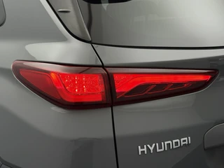 Hyundai Kona EV Premium 64 kWh SOH 90,1% Warmtepomp | Leer | Head-Up | Elektr. Stoelen | Adaptive Cruise / 28