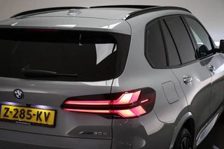BMW X5 xDrive50e M-Sport | PANORAMADAK | HEAD UP | HOUTAFWERKING | ACHTERBANKVERWARMING | TREKHAAK | 360 CAMERA | 21" / 35