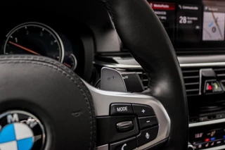BMW 5-serie M550d xDrive High Executive | 2e eigenaar | Driving Assistant Plus | Innovation pakket | Stoelverwarming & -ventilatie | Stuurverwarming | Harman-kardon | 360 camera / 25