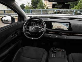Nissan Ariya Evolve 91 kWh | SOH 99% | Panoramadak | Trekhaak | ACC | HUD | Voorstoelen verwarmd en geventileerd | Warmtepomp | 360 Camera | 19" / 17