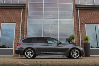 BMW 3-serie Touring 318i Centennial Executive M-sport | 2e eigenaar | HiFi audio | Navigatie | Bluetooth | Climate control | M-sportstuur | Cruise control | PDC | 18 inch | Trekhaak / 8