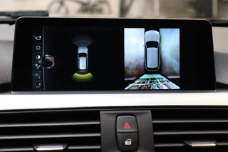 BMW 3 Serie Touring 330i High Executive M Sport Pakket Automaat  / Navigatie Professional / Panoramadak / Leder  / Trekhaak / Parkeersensoren voor+achter / Comfort Acces / Head-Up Display / Stoelverwarming / Achteruitrijcamera / Hifi / 19 Inch / Chrome Line / 29
