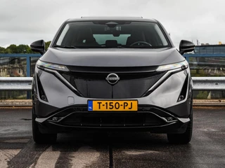 Nissan Ariya Evolve 91 kWh | SOH 99% | Panoramadak | Trekhaak | ACC | HUD | Voorstoelen verwarmd en geventileerd | Warmtepomp | 360 Camera | 19" / 6