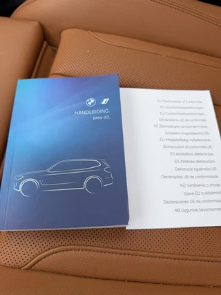 BMW IX3 M SPORT pakket 80 kWh, panoramadak, SOH 98,2 %,vol opties, 1 e eigenaar,conjac sport leder, Origineel NL auto met nap / 21