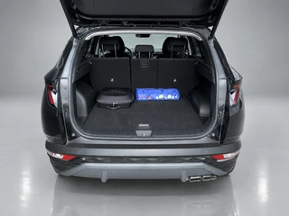 Hyundai Tucson 1.6 T-GDI PHEV 265 pk Comfort Smart 4WD | 1e eigenaar | navigatie | elektr. a. klep | adapt. cruise | camera | BTW auto / 21