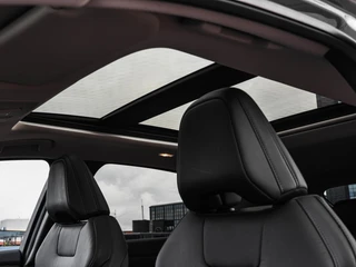 Nissan Ariya Evolve 91 kWh | SOH 99% | Panoramadak | Trekhaak | ACC | HUD | Voorstoelen verwarmd en geventileerd | Warmtepomp | 360 Camera | 19" / 14