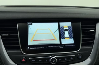 Opel Grandland X 1.6 Turbo 300pk Hybrid4 Elegance | Navigatie | Keyless | Camera | Parelmoer kleur | Electrische achterklep | Lichtmetalen velgen | AGR Comfortstoelen | Voorruitverwarming | Zwart dak / 34