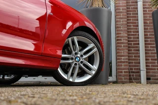 BMW 1-serie 125i Business+ | Sport Line | NL auto | Schuif-/kanteldak | Keyless entry | HiFi audio | Stoelverwarming | Xenon | Sportstuur | Navigatie Professional | Bluetooth | PDC / 46