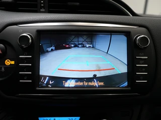 Toyota Yaris 1.5 Hybrid Bi-Tone ✅All Season✅Trekhaak✅Stoelverw.✅Clima✅Camera✅ / 7