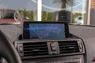 BMW 1-serie 125i Business+ | Sport Line | NL auto | Schuif-/kanteldak | Keyless entry | HiFi audio | Stoelverwarming | Xenon | Sportstuur | Navigatie Professional | Bluetooth | PDC / 24