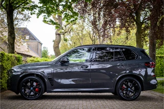 BMW X5 xDrive50e M Sport Pro Dravitgrau Individual Dravit Grau Sky Lounge Soft Close Vierwielbesturing / 4